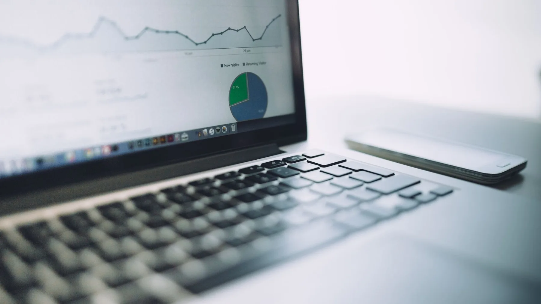Consultant reviewing a data dashboard for an AI feasibility assessment