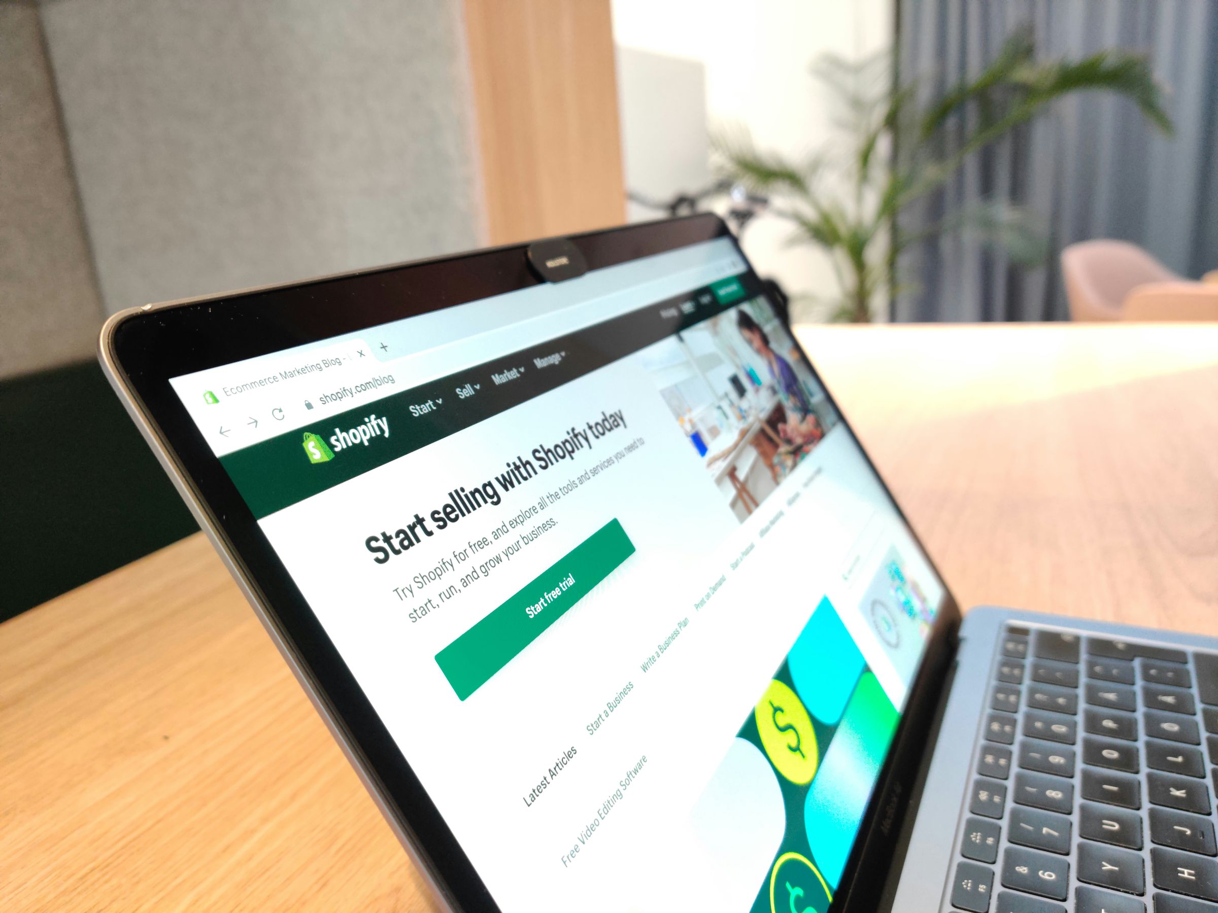 Shopify public webpage displayed on a laptop in Helsinki