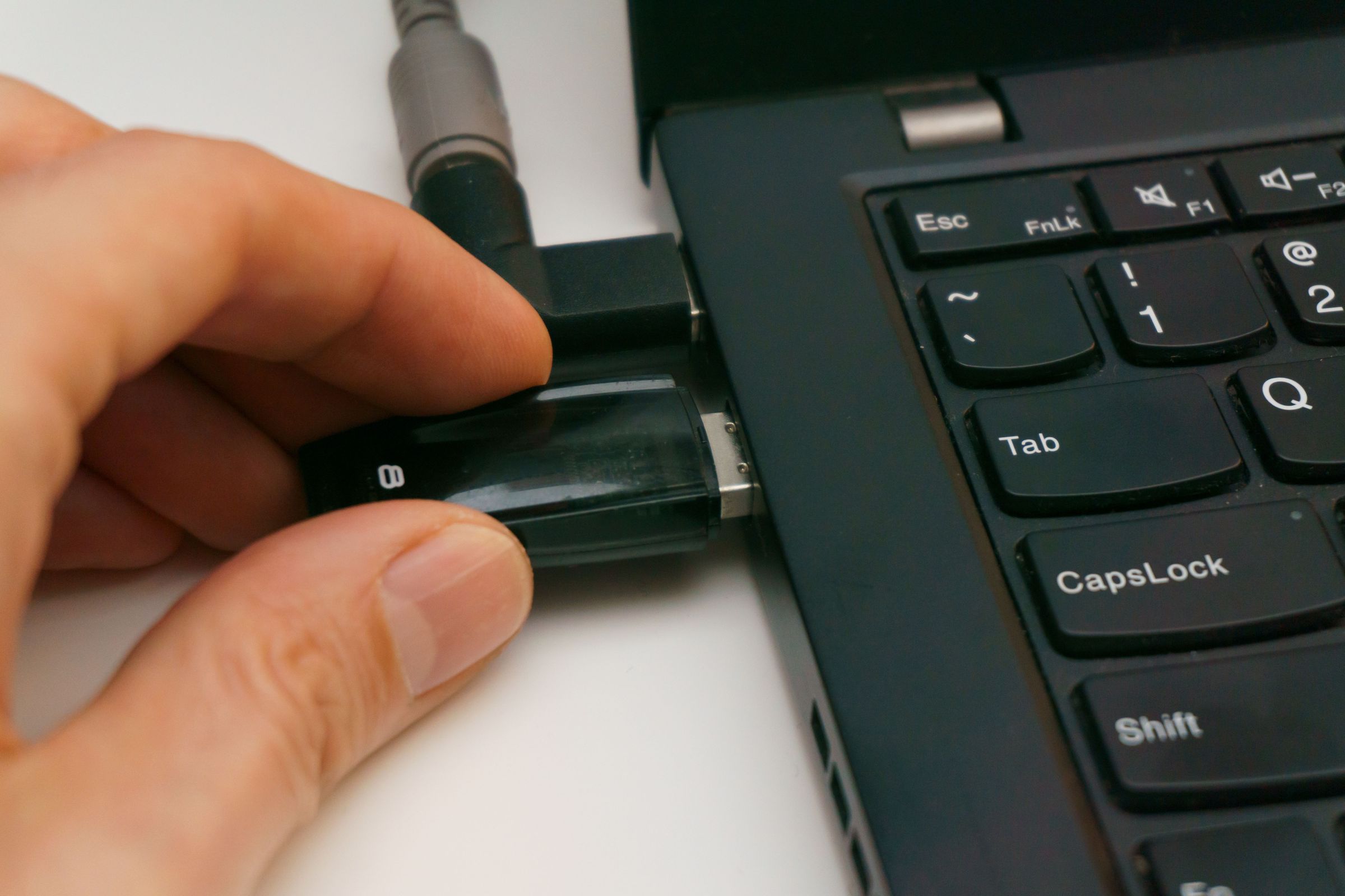 Inserting a USB storage device into a laptop port