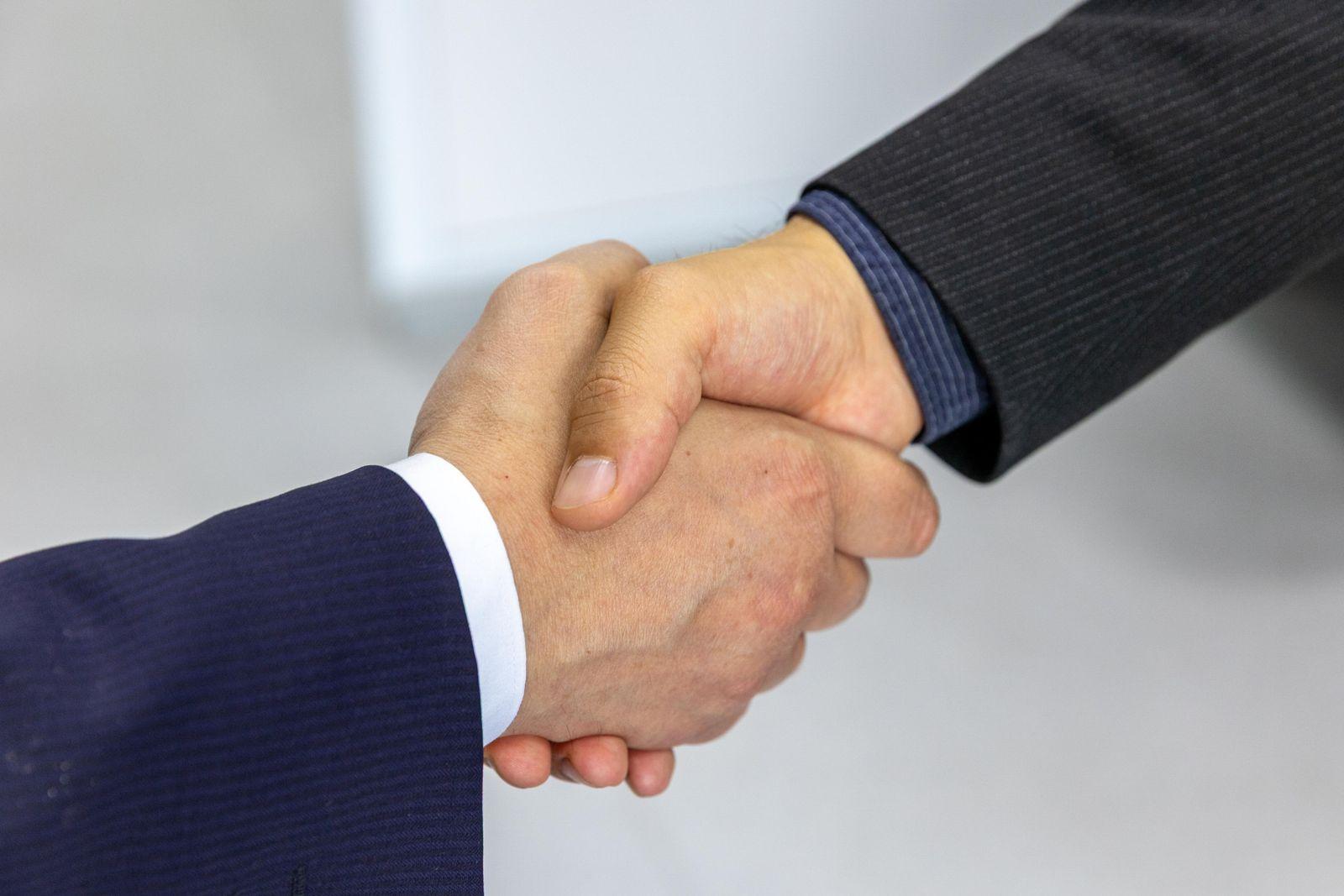 Business owner reviewing a source-code ownership clause in a website contract