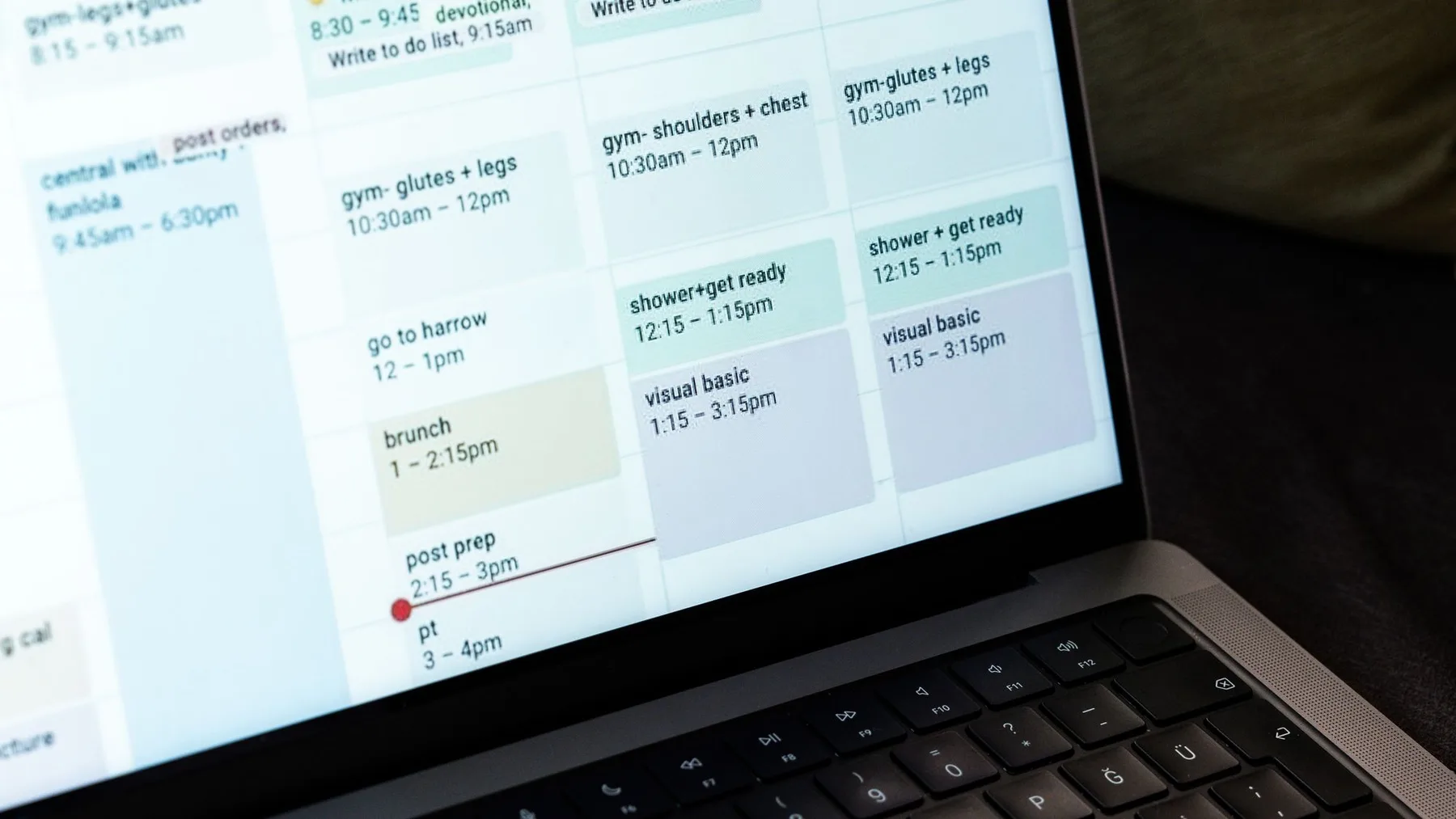 Digital calendar on a laptop representing clinic appointment management