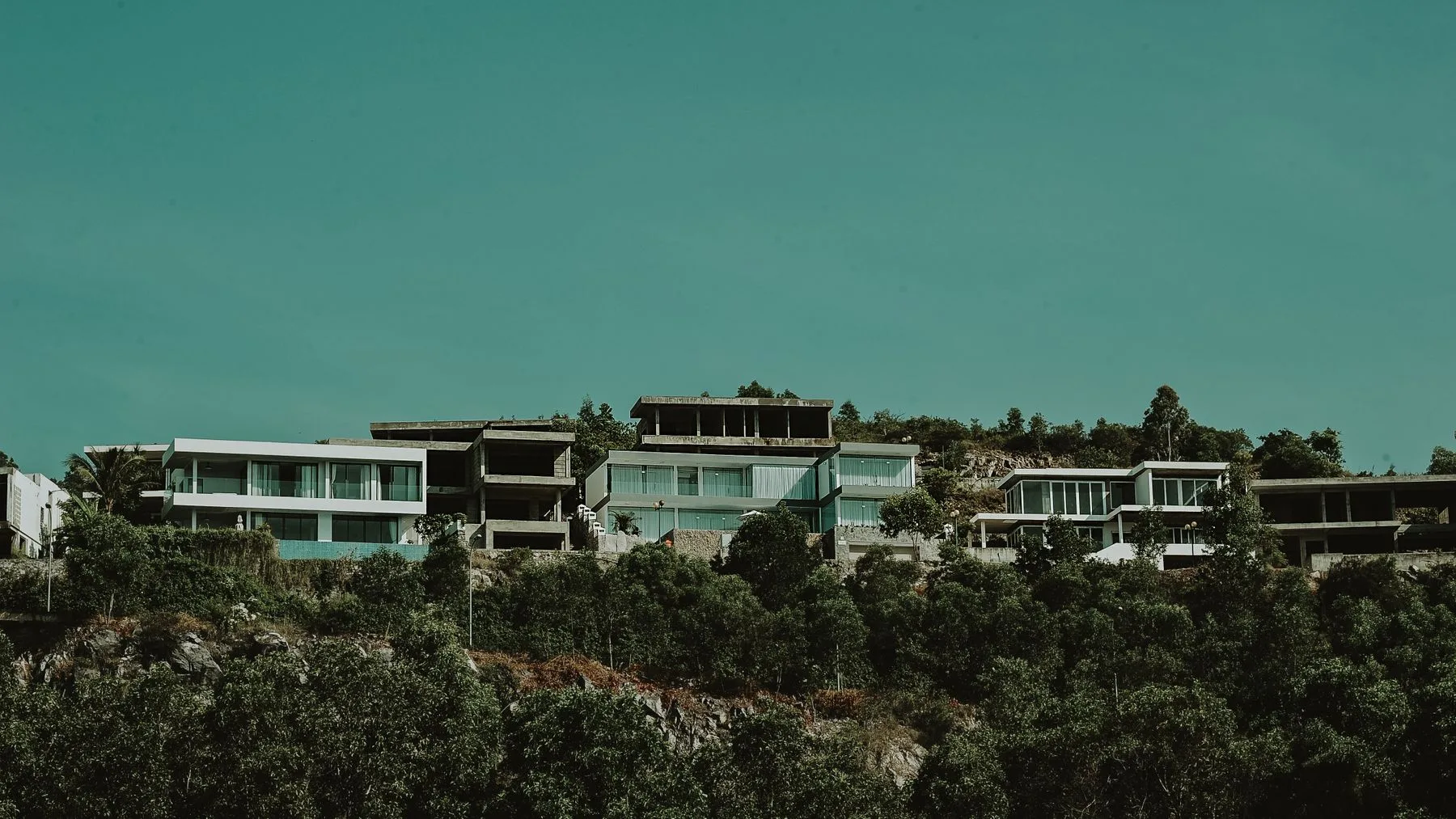 Modern villa listed on a real estate website